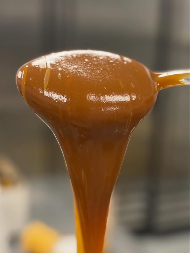 Housemade caramel sauce pour at Big Feeling creamery